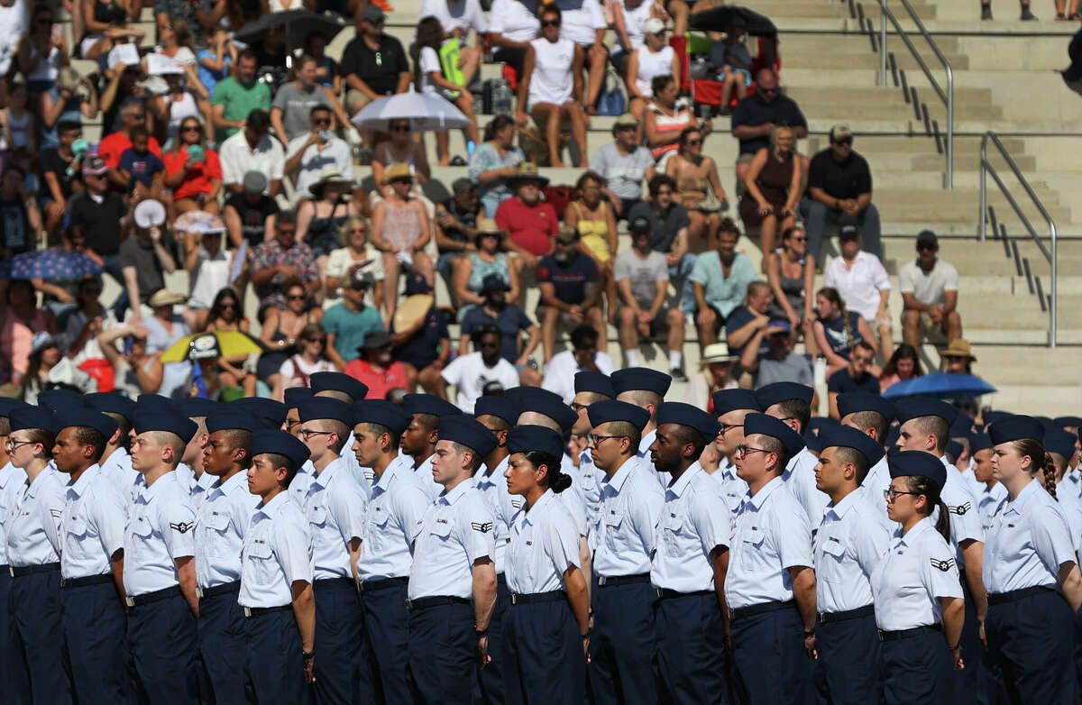 U.S. Air Force recruits are sworn in during halftime on Salute to