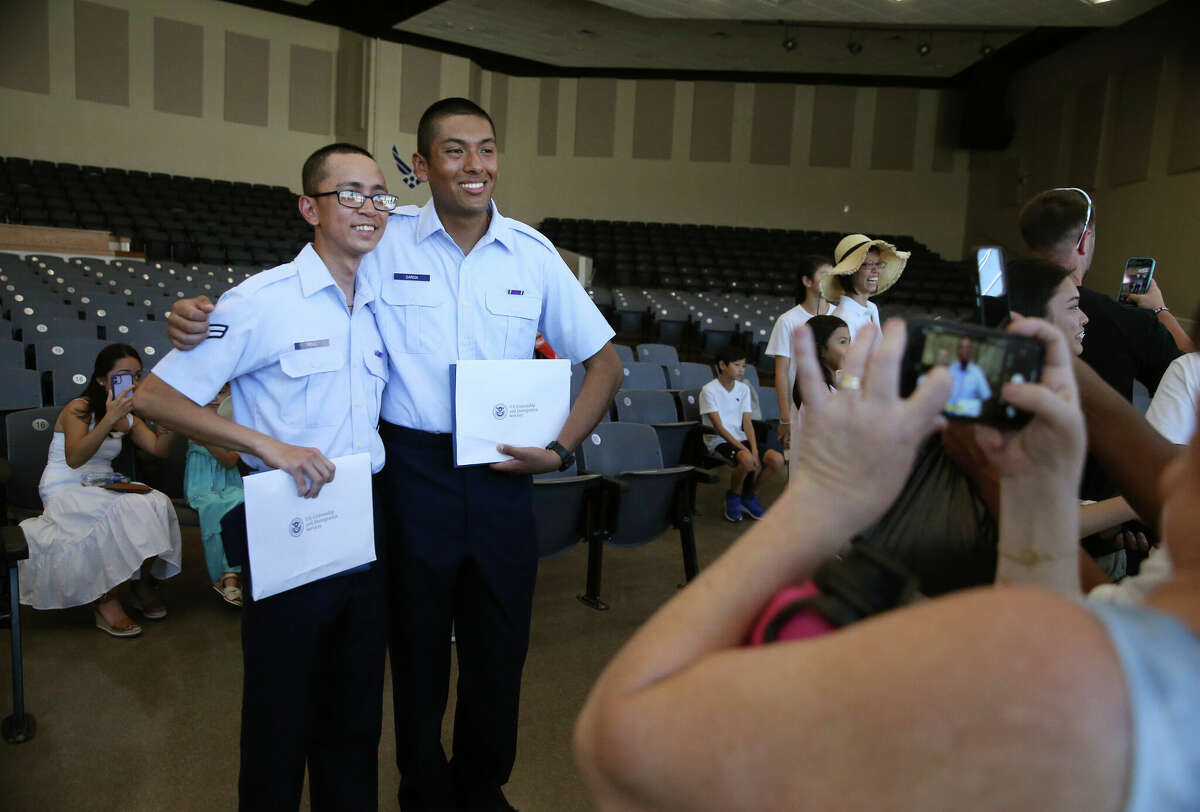 U.S. Air Force recruits are sworn in during halftime on Salute to