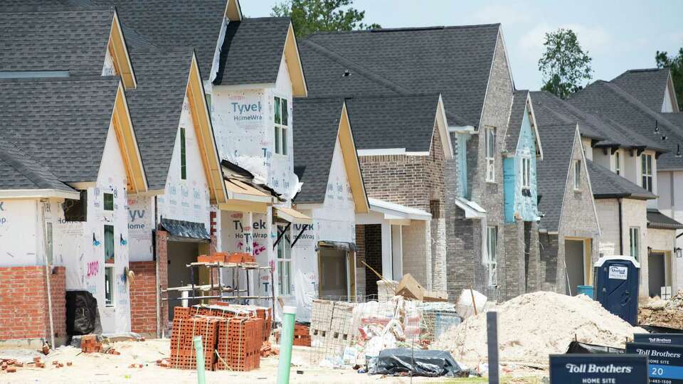 Home construction continues near Conroe ISD's Christopher J. Hines Elementary, Wednesday, June 28, 2023, in Spring.