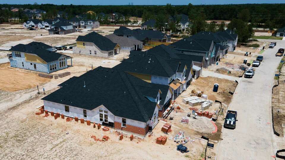 Home construction continues near Conroe ISD's Christopher J. Hines Elementary, Wednesday, June 28, 2023, in Spring.