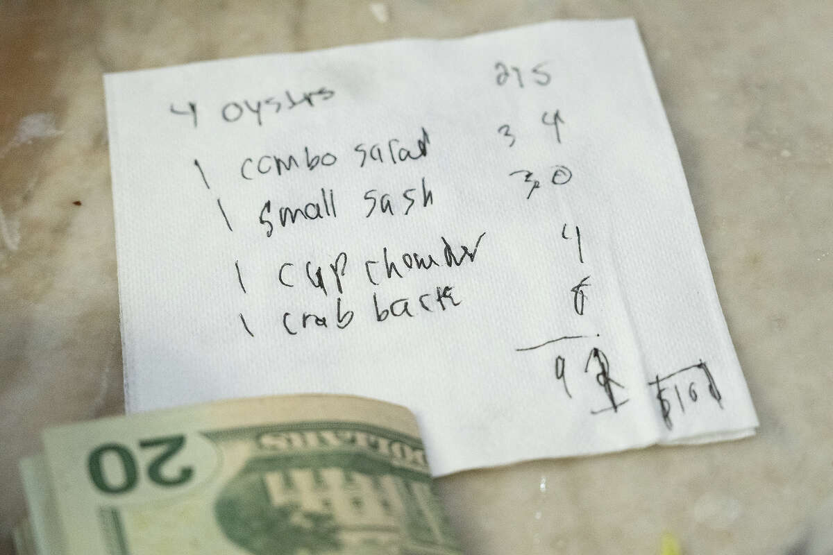 The bill on a napkin at Swan Oyster Depot in San Francisco, June 27, 2023.