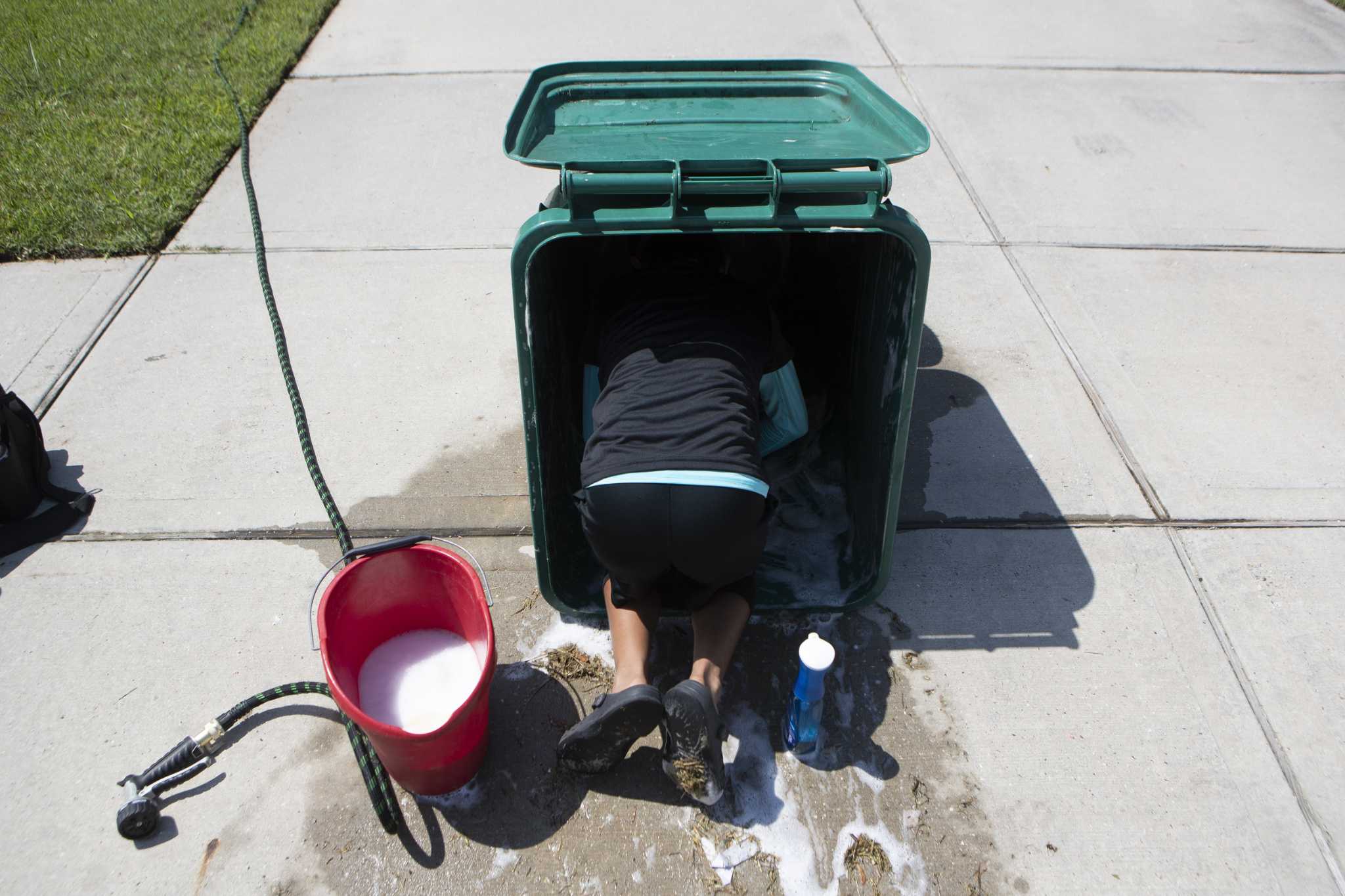 Houston's 'The Garbage Kid' grows popular New Caney trash can business