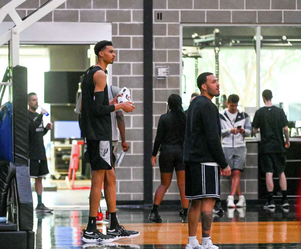 Victor Wembanyama watches his teammates during a practice at the San Antonio Spurs practice facility Thursday, June 29, 2023. The team will soon leave San Antonio for summer league play.