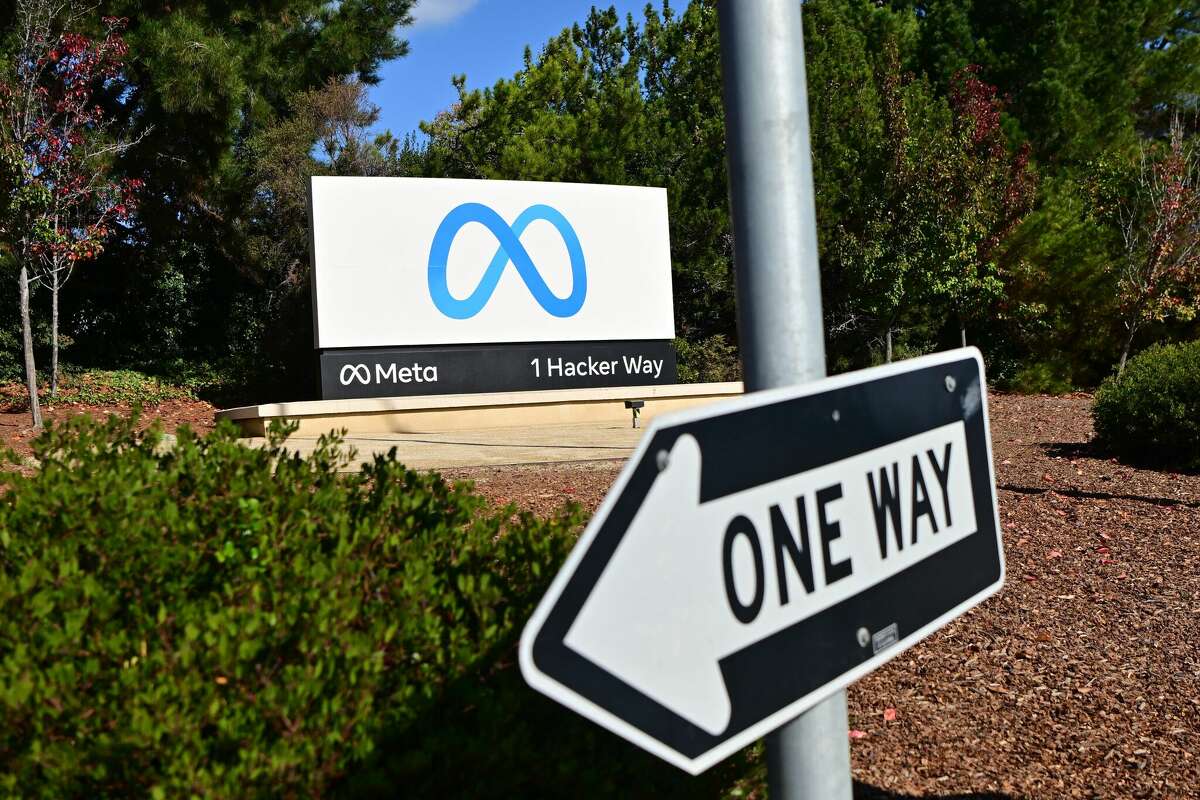 A one way sign is seen in front of Meta's corporate headquarters in Menlo Park, California on November 09, 2022. The Facebook owner has laid off over 20,000 employees since November.