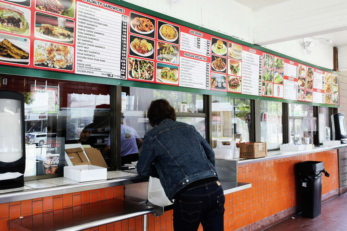 A customer orders food at Lucky Boy in Pasadena Calif., June 29, 2023