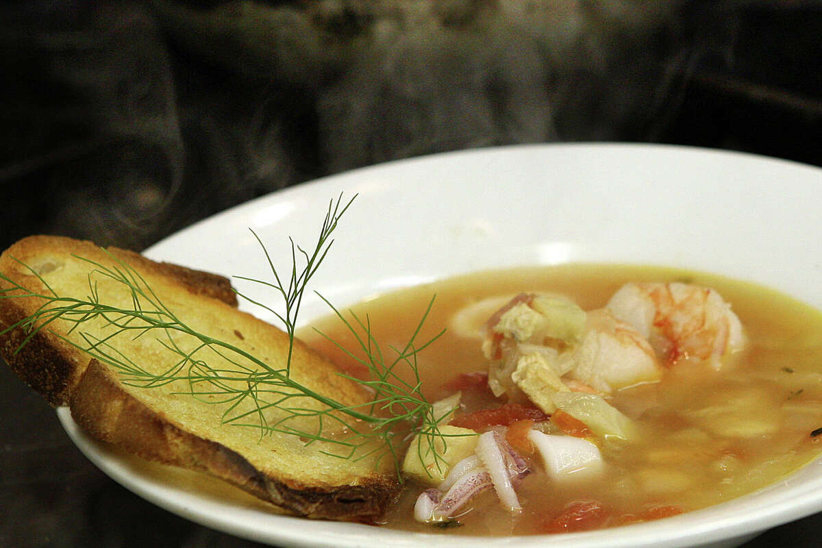 Seafood chowder--seafood, herbs and stewed heirloom tomatoes--at Forbes island restaurant between Pier 41 and Pier 39 in San Francisco, Calif., on Thursday, July 1, 2010.