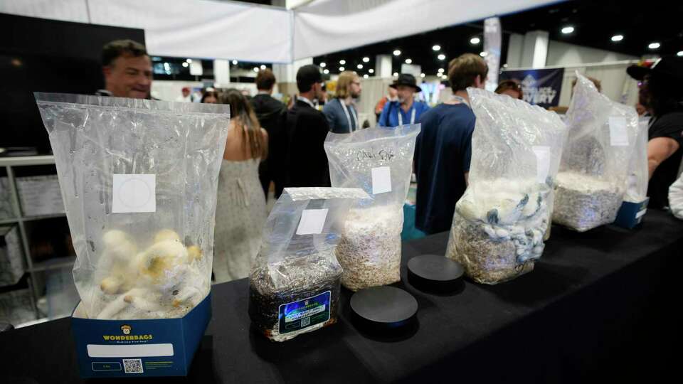 Exhibitors display their goods at the Psychedelic Science conference in the Colorado Convention Center Wednesday, June 21, 2023, in Denver. (AP Photo/David Zalubowski)