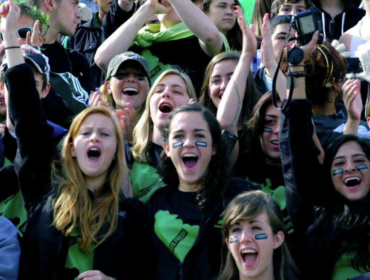 SPECTRUM/Students cheer during a pep rally for Homecoming at New Milford High School. Oct. 15, 2010