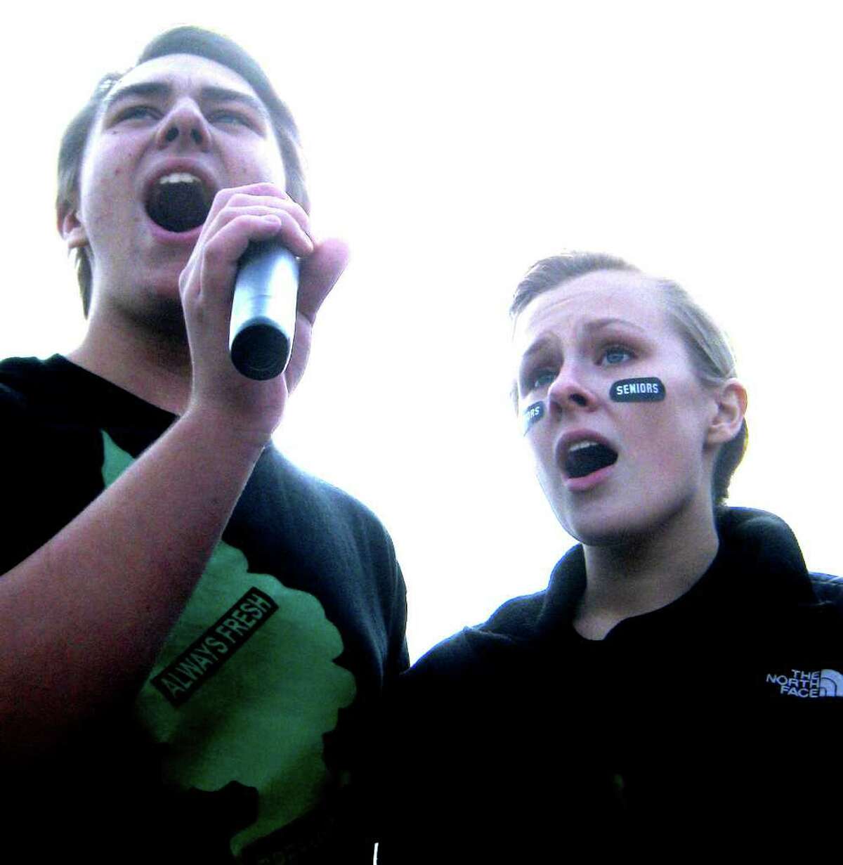 SPECTRUM/Kelsey Brofford perform the Star Spangled Banner at Homecoming pep rally at New Milford High School. Oct. 15, 2010