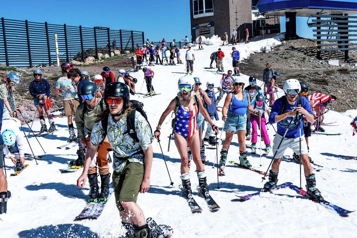 Huge crowds mob Tahoe for a festive, Speedoclad close of ski season