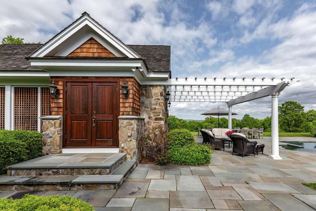 Roxbury hills home with 8car garage, lofted library listed for 3.3M