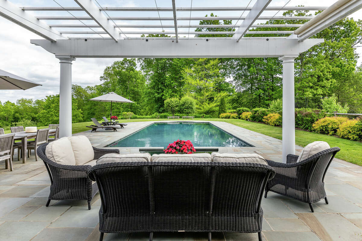 Roxbury hills home with 8car garage, lofted library listed for 3.3M