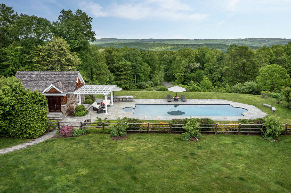 Roxbury hills home with 8car garage, lofted library listed for 3.3M