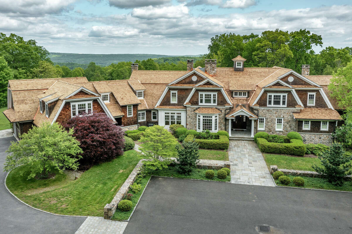 Roxbury hills home with 8car garage, lofted library listed for 3.3M