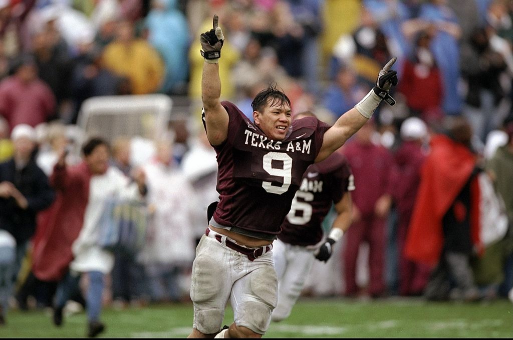 Dallas Cowboys linebacker Dat Nguyen celebrates after Seattle fumbled the  ball and Dallas recovered it on Monday night football against the Seattle  Seahawks at Quest field in Seattle, WA.