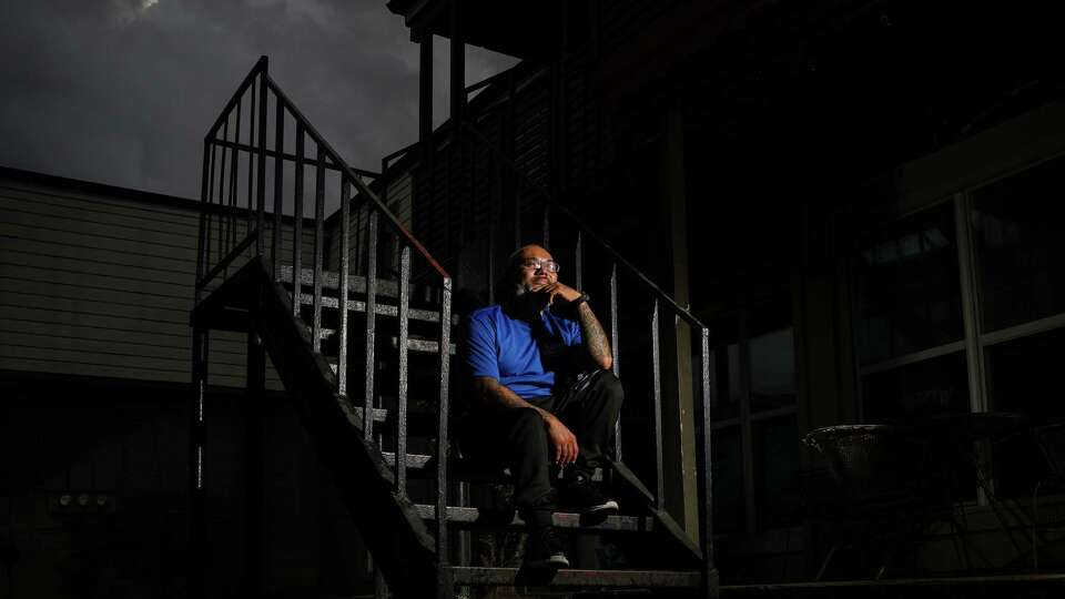 Alfredo Islas poses for a portrait Wednesday, July 5, 2023, at his apartment in Houston. He said he decided to change his life in 2015 while in prison, and he talked about the importance of reentry programs in that process.