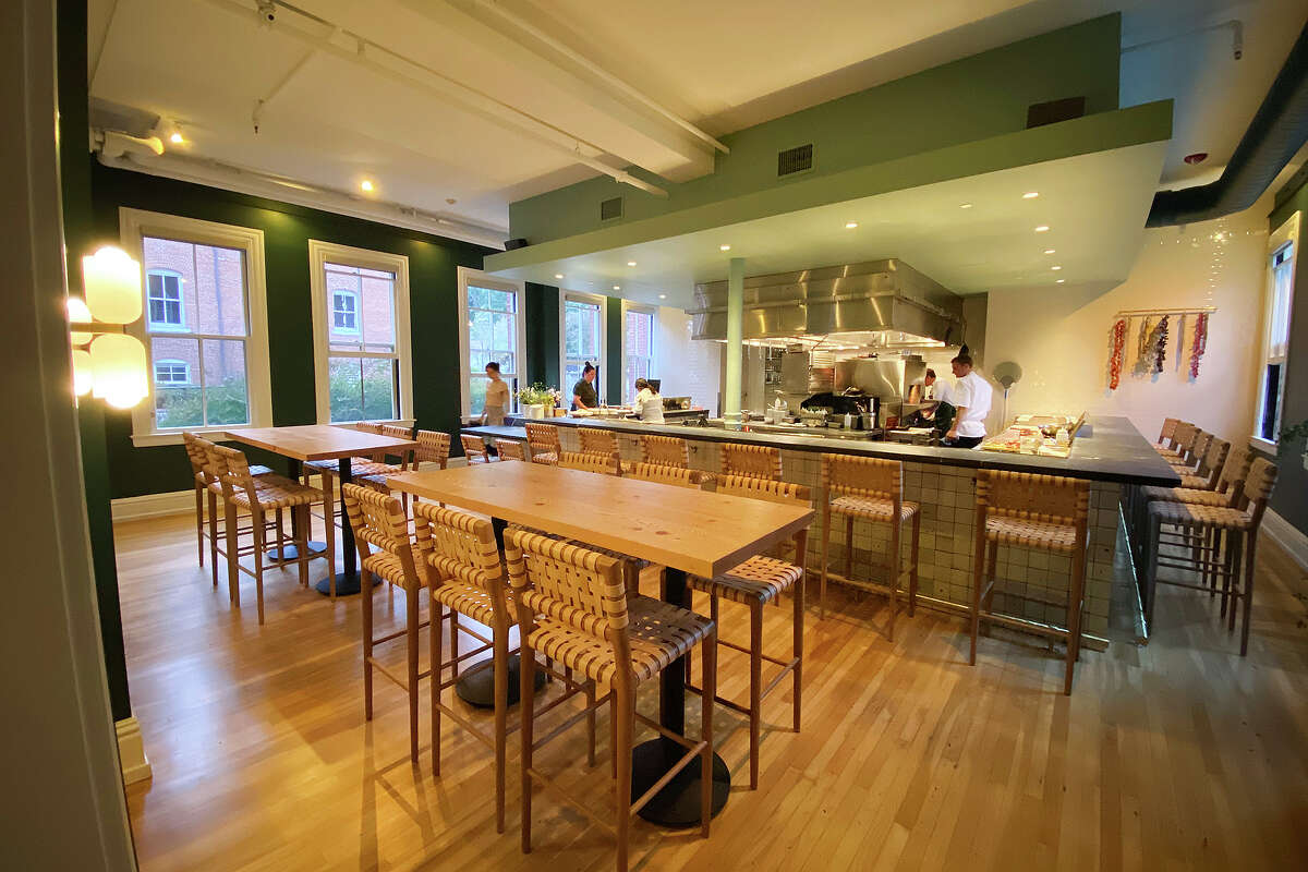 The open kitchen with a kitchen counter at Dalida in San Francisco.