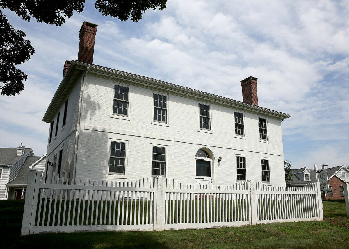 Ellington votes to keep historic Pinney House lease, pay for utilities