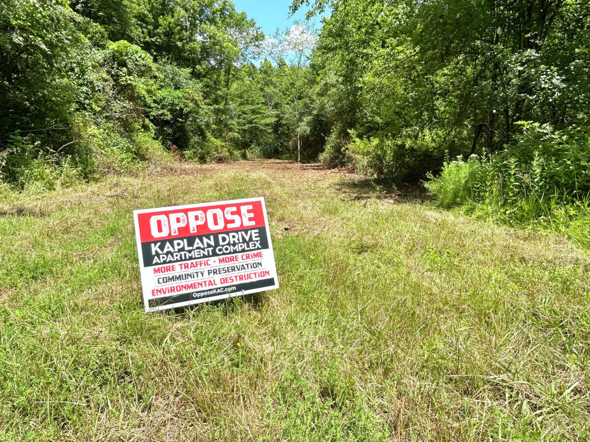 Public views site of housing proposal near Middletown wetlands