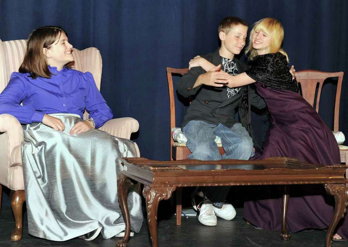 Left to right, Michelle Bohin, 13, Billy MaGrino, 11 and Ayla Slifka, 13, in a scene from “The £1,000,000” Bank Note” by Mark Twain. Students in the New Fairfield Middle School Drama group will be performing the play at the school, Thursday, Oct. 28 at 1:30pm for fellow students and again at 7pm for family and the public. Admission is $2 a ticket. Photo taken Tuesday, Oct. 19, 2010.