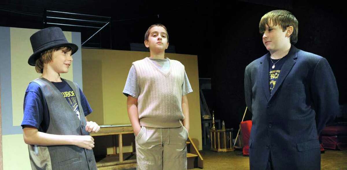 Left to right, Jay Broderick, 13, Brandon Gasparino, 12 and Jake Monahan, 13, in a scene from “The £1,000,000” Bank Note” by Mark Twain. Stuendts in the New Fairfield Middle School Drama group will perform the play Thursday, Oct. 28 at 1:30 p.m. for fellow students and again at 7p.m. for family and the public. Admission is $2 a ticket. Photo taken Tuesday, Oct. 19, 2010.