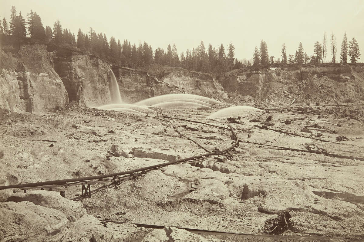 Malakoff Diggins, looking east. Shows pressure pipes and water from monitors.between 1869 and 1871