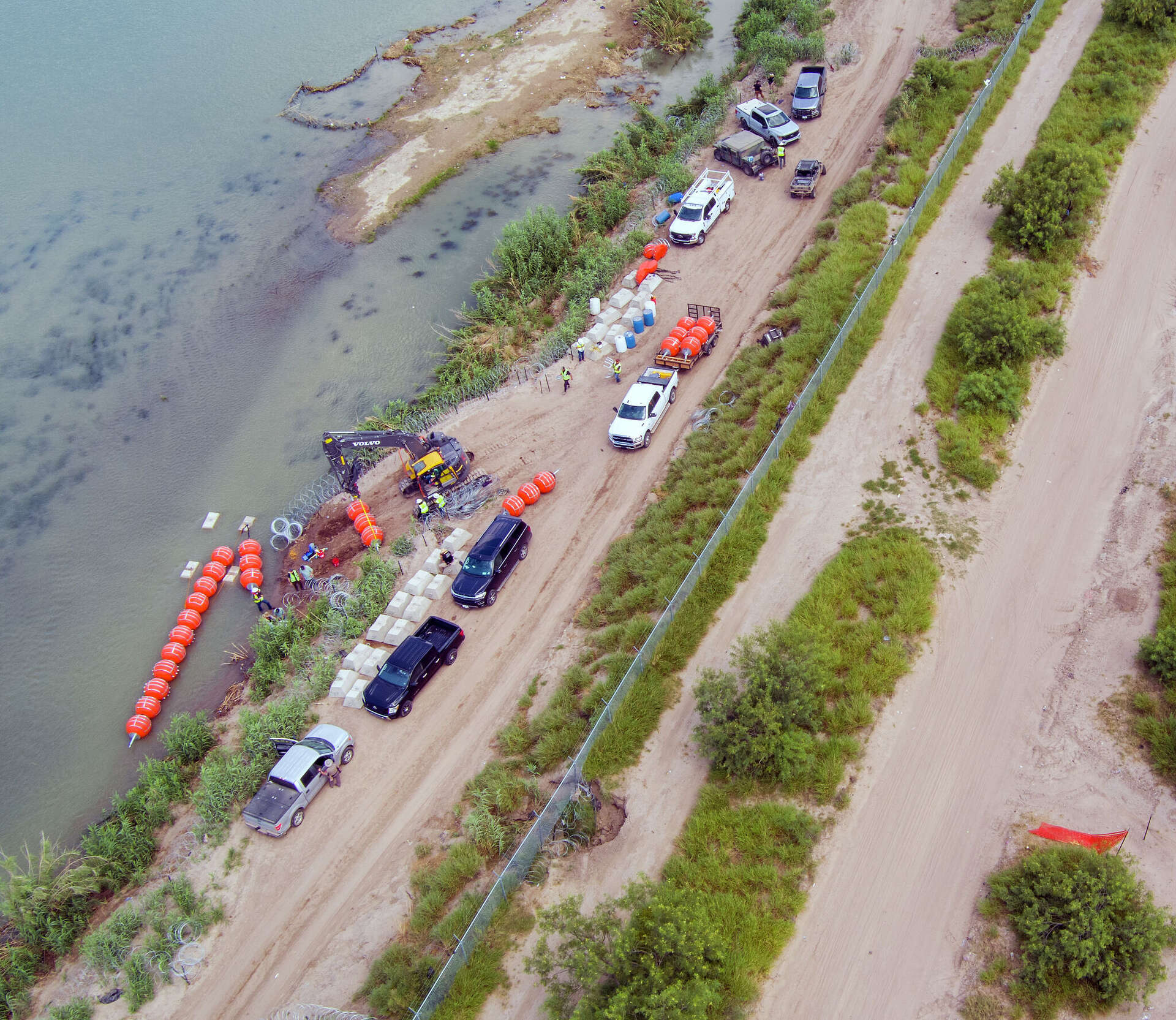 Texas puts border barrier buoys, nets in Rio Grande to deter crossings