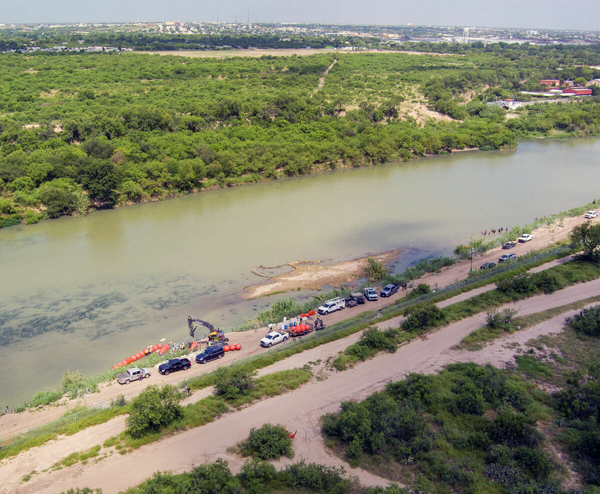 Texas Puts Border Barrier Buoys, Nets In Rio Grande To Deter Crossings