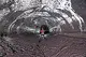 Article Image Arched passages in the main tube show the classic lava tube shape. The floor was the crust on a former lava lake that fell inward as it drained from beneath. Kazumura Cave on Hawaii Island, Jan. 11, 2008.