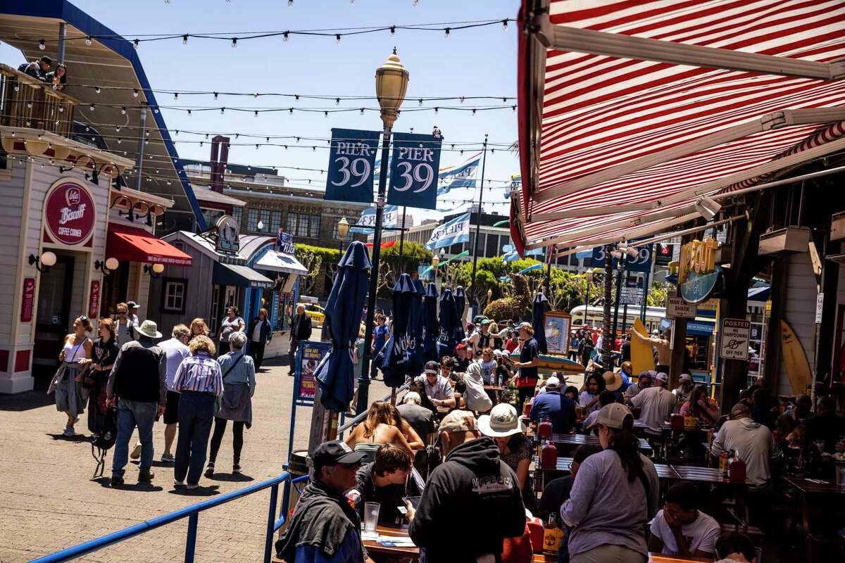 Visitors check out Pier 39 in San Francisco.