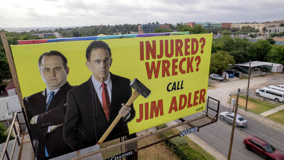 A billboard advertising personal injury lawyer Jim Adler, aka 'The Texas Hammer,' on Commerce Street in San Antonio.