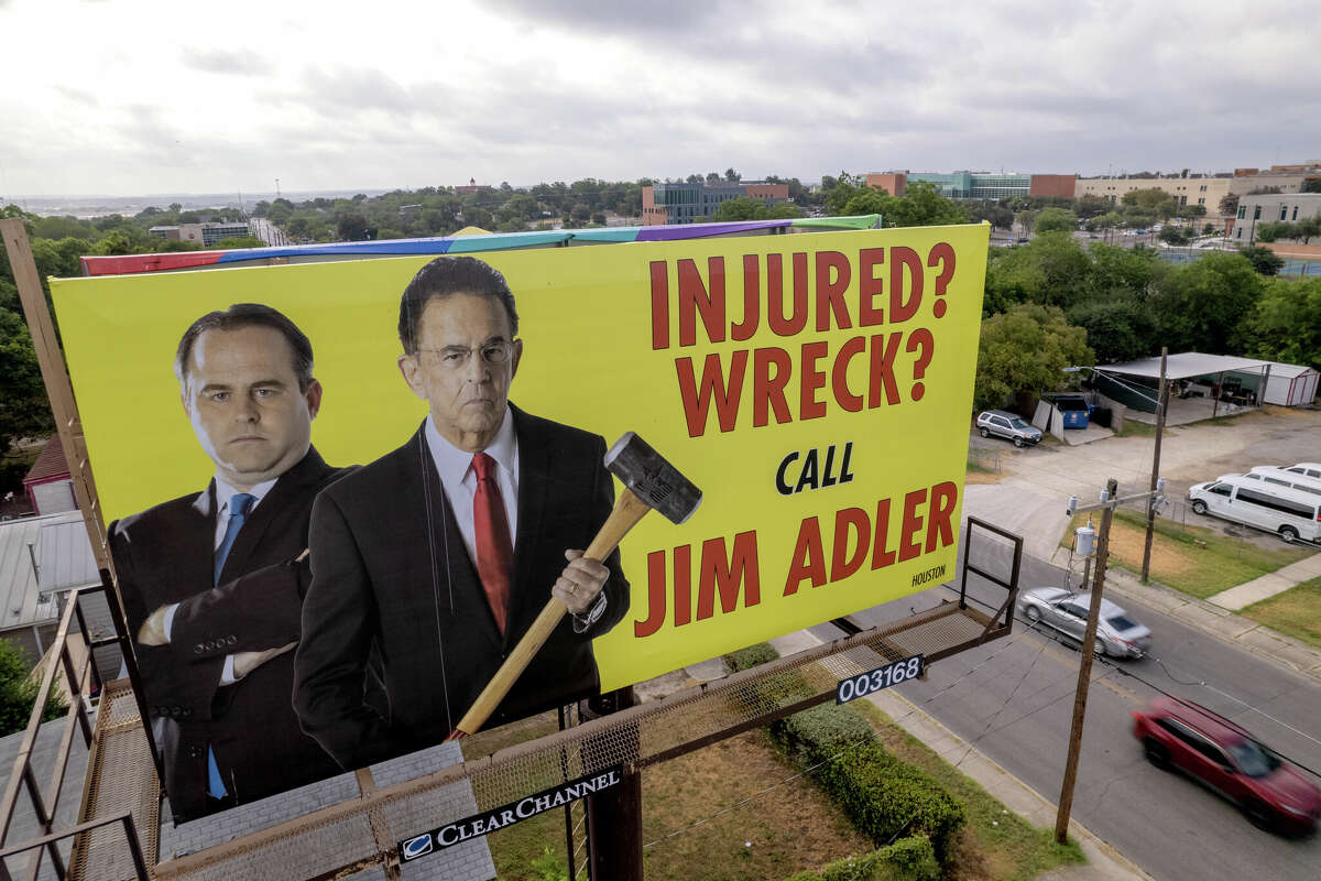 A billboard advertising personal injury lawyer Jim Adler, aka 'The Texas Hammer,' on Commerce Street in San Antonio.