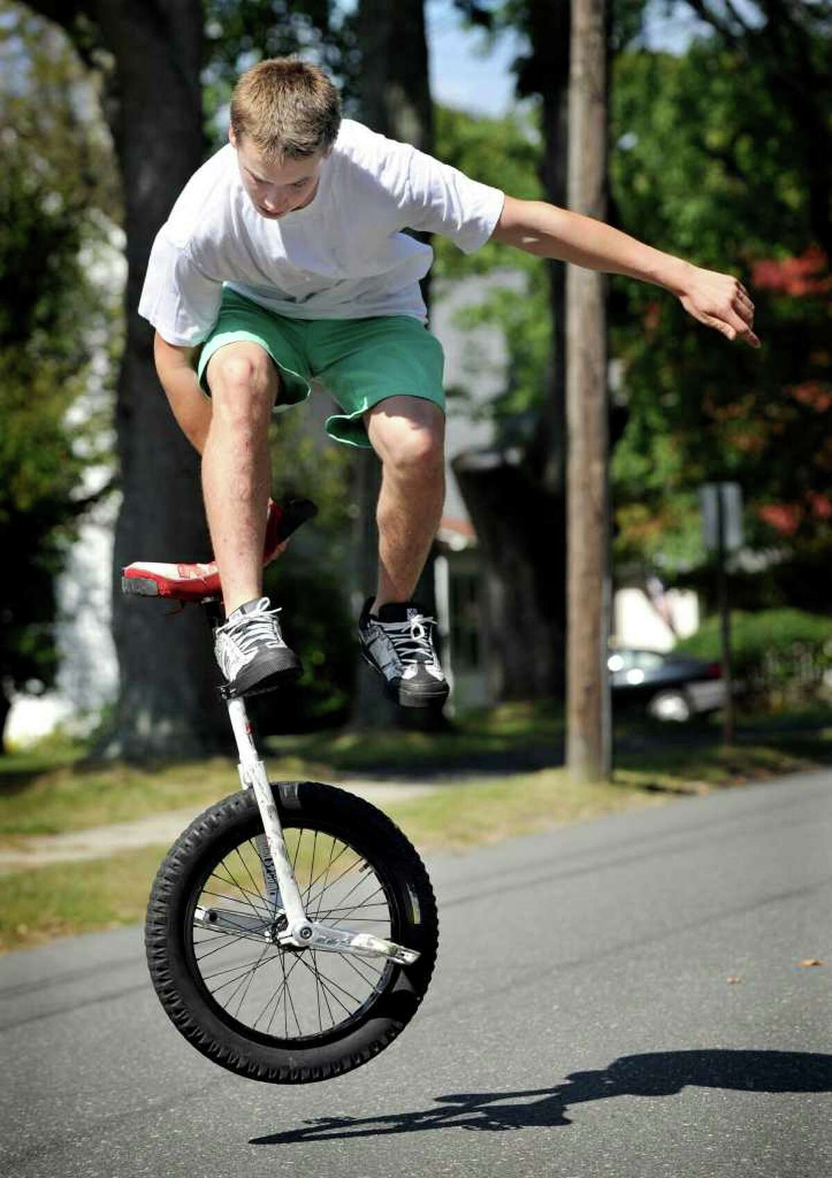 Unicycle fanatic loves to fly