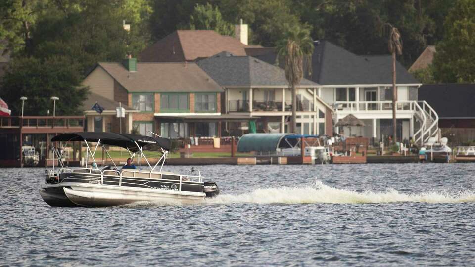 Boaters traverse Lake Conroe, Thursday, July 13, 2023, in Conroe.