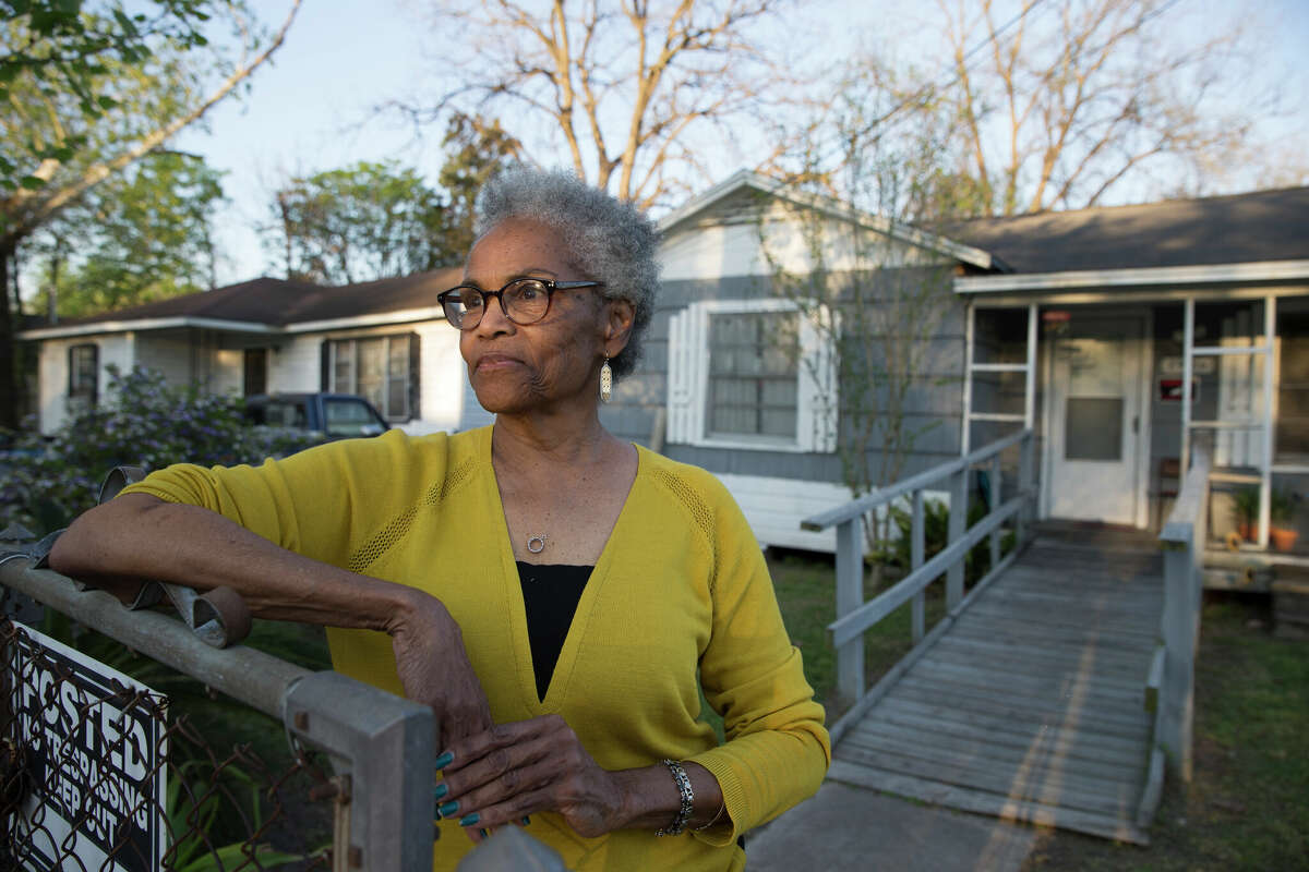 Barbara Beal, who died Aug. 8, posed for a photograph at her mother's house on Lavender Street on Thursday, March 21, 2019, in Houston. Beal said she moved into the house when she was nine years old. After living there on and off during adulthood, she moved back full-time when she started to care for her elderly mother. Beal died of lung cancer after living near a wood treatment facility that filled the neighborhood with the cancer-linked toxin creosote for decades.