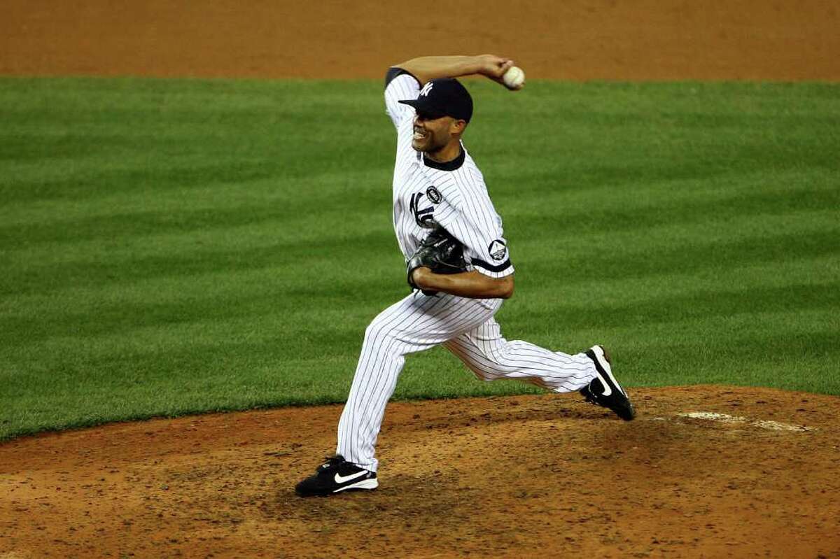 NEW YORK - OCTOBER 20: Mariano Rivera #42 of the New York Yankees pitches against the Texas Rangers in Game Five of the ALCS during the 2010 MLB Playoffs at Yankee Stadium on October 20, 2010 in the Bronx borough of New York City. (Photo by Andrew Burton/Getty Images) *** Local Caption *** Mariano Rivera