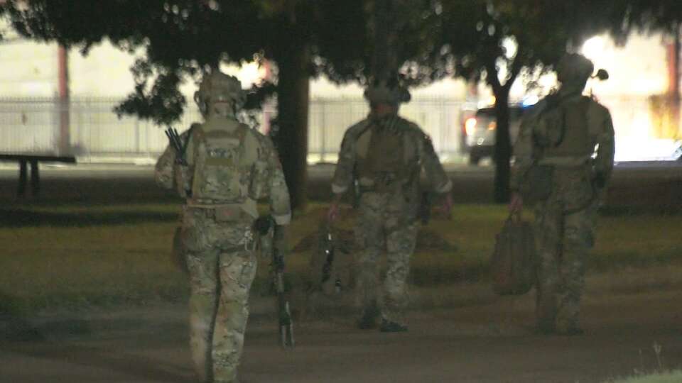 The Harris County Sheriff's Office SWAT team responded to a game room last night to detain a woman wanted on six warrants. 