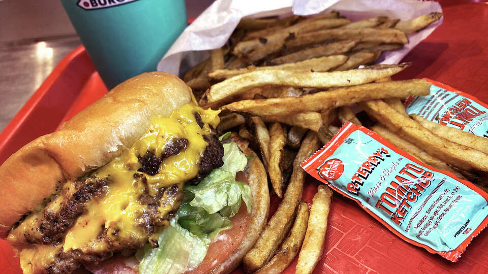 A combo with a double cheeseburger, handcut fries and a drink is a popular option at P. Terry's Burger Stand, the Austin chain that is coming to Houston.