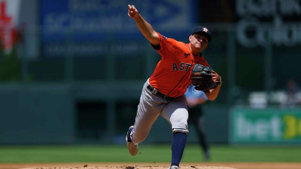 DENVER, CO - JULY 19: Starting pitcher Brandon Bielak #64 of the Houston Astros pitches in the first inning against the Colorado Rockies at Coors Field on July 19, 2023 in Denver, Colorado.