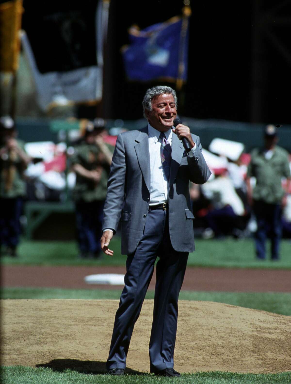 Singer Tony Bennett sings the National Anthem prior to an MLB game in April 1993 in San Francisco.