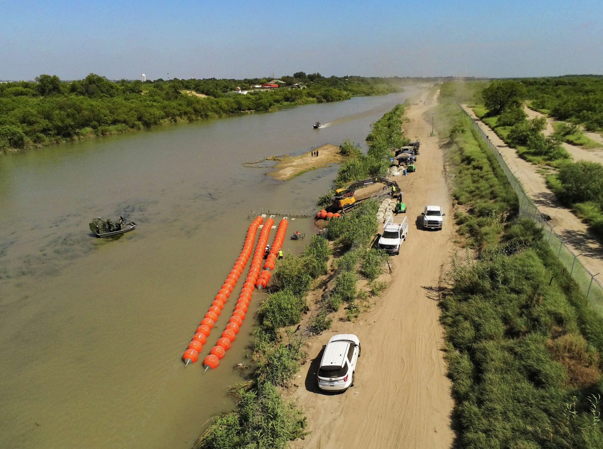 DOJ says it will sue Greg Abbott over buoy barrier in Rio Grande
