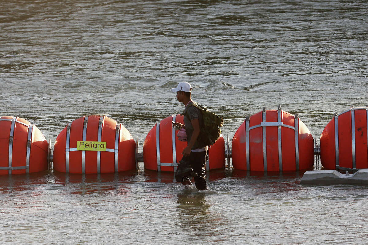 Story photo for DOJ is suing Abbott over border buoys