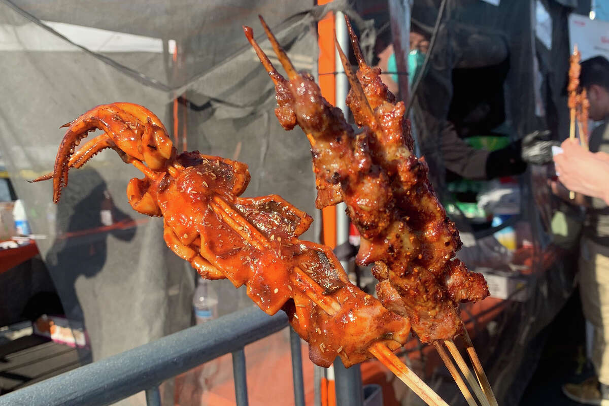 Charcoal-grilled squid and chicken skewers from Taste Memory at 626 Night Market in Pleasanton, Calif.