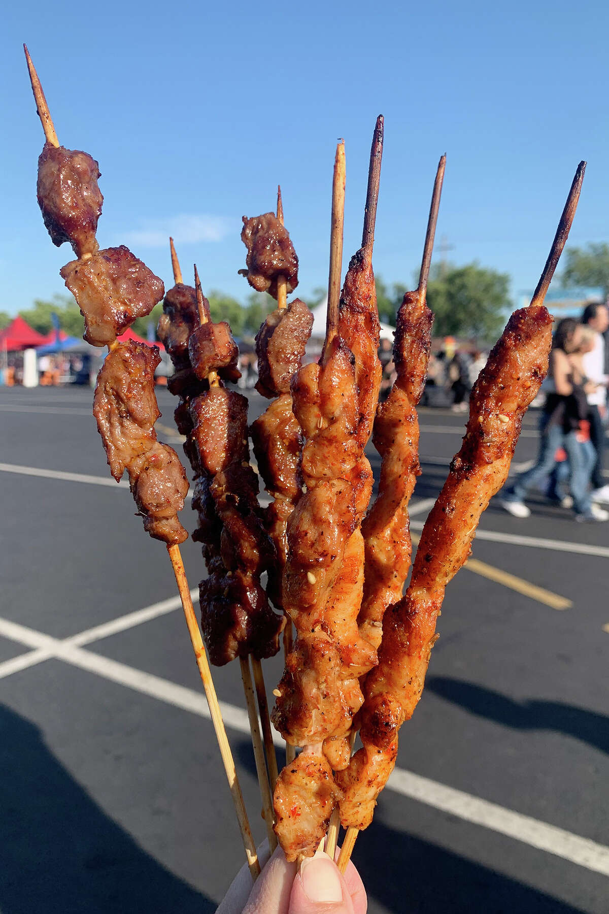 The chicken, beef and lamb skewers from Michael Liu’s Taste Memory at 626 Night Market in Pleasanton have a reddish hue from multiple spices.