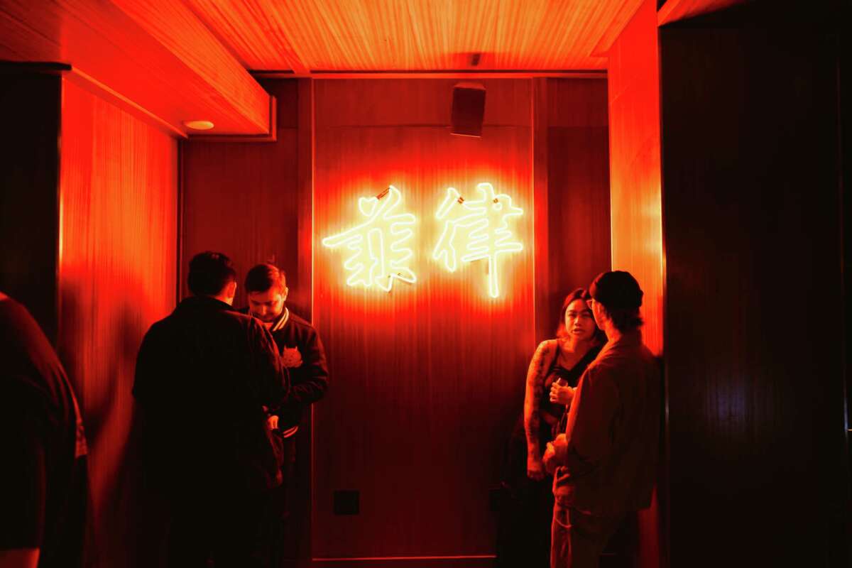 Customers chat and drink at new bar the Felix in San Francisco.