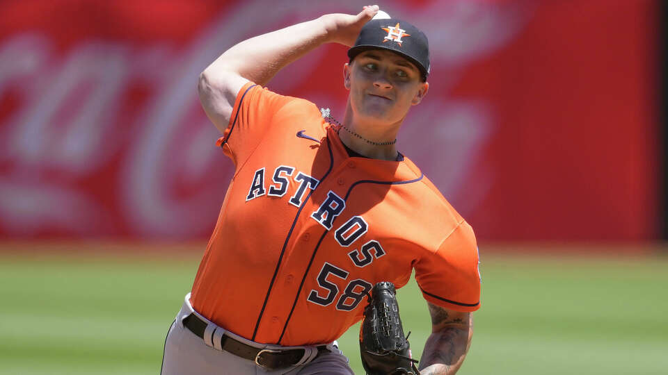 Houston Astros pitcher Hunter Brown (58) works against the Oakland Athletics during the first inning of a baseball game in Oakland, Calif., Sunday, July 23, 2023. (AP Photo/Jeff Chiu)
