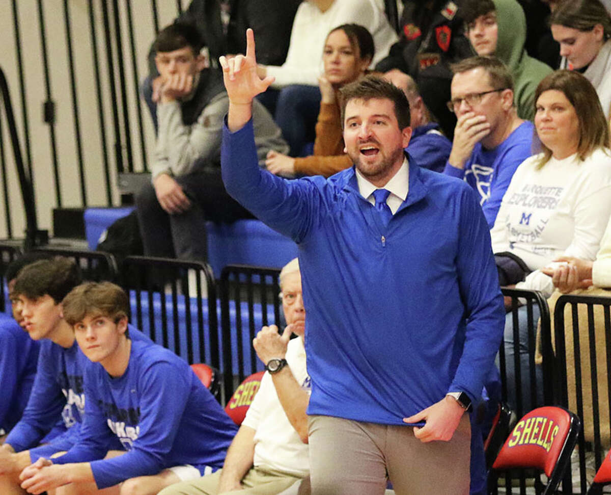 Marquette Catholic coach Cody Best calls for a play during November's Hoopsgiving Classic at Roxana. Best is the 2022-23 Telegraph Small-Schools Boys Basketball Coach of the Year.