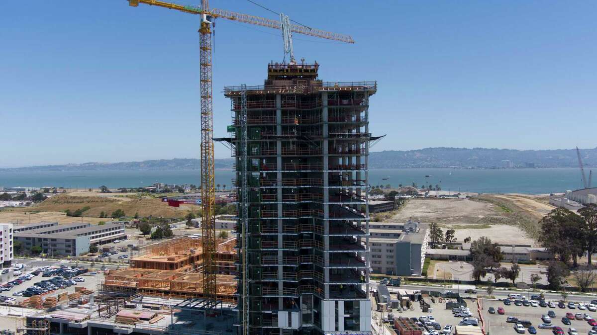 The Tidal House, under construction on Treasure Island, is one of the few housing towers being built in San Francisco. The city has decided to reduce fees and affordability requirements in hopes of activating more development.