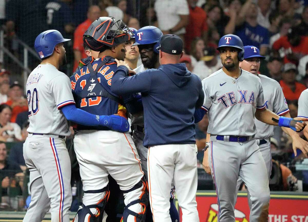 MLB roundup: Benches clear, Rangers slam Astros