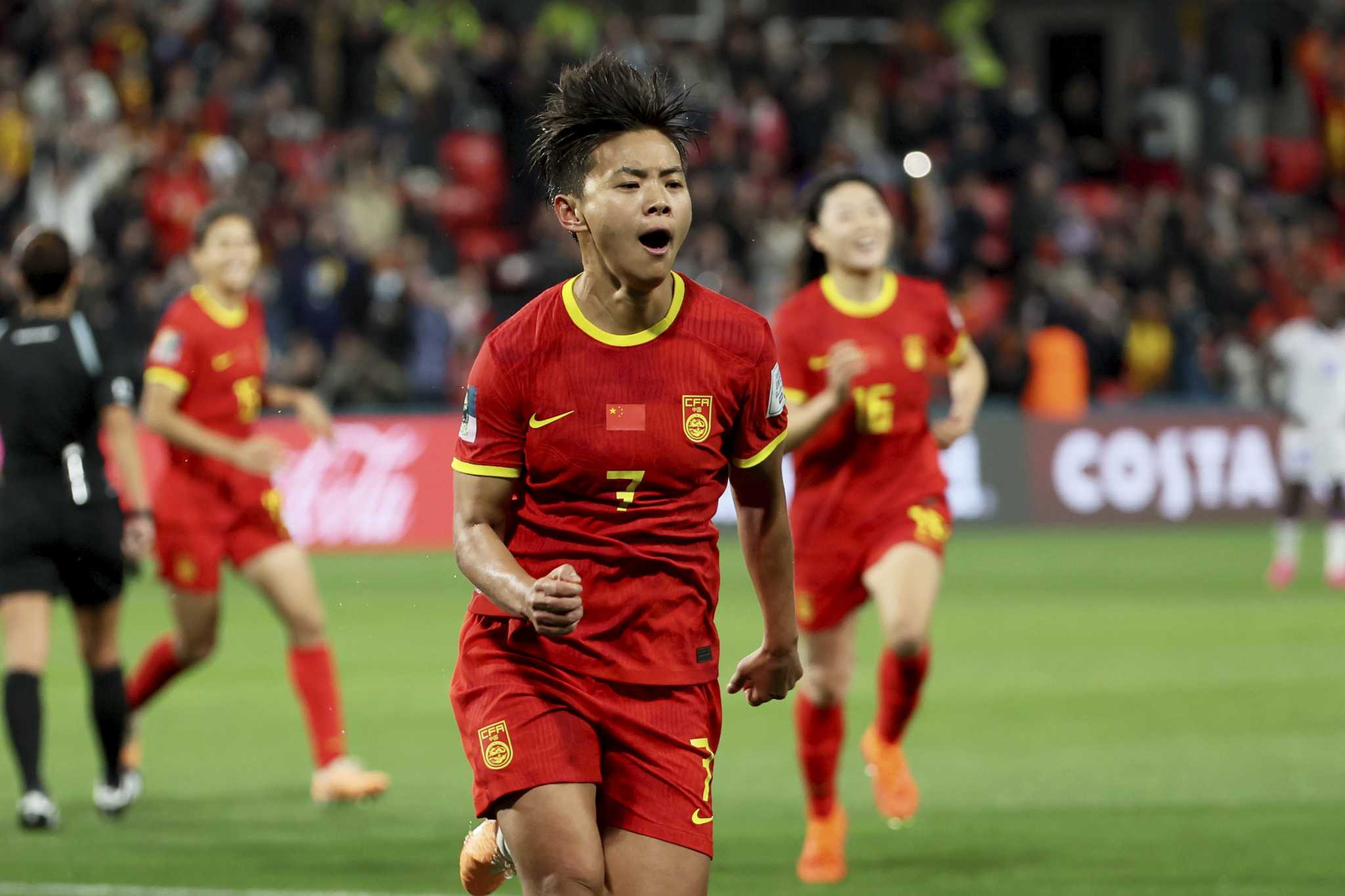 China edges Haiti to keep World Cup hopes alive
